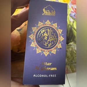 Dukhni Attar Al Gharam half full